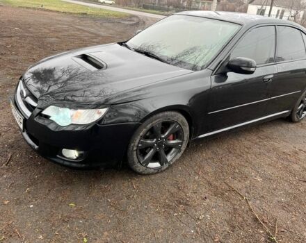 Черный Субару Легаси, объемом двигателя 2 л и пробегом 327 тыс. км за 5500 $, фото 1 на Automoto.ua