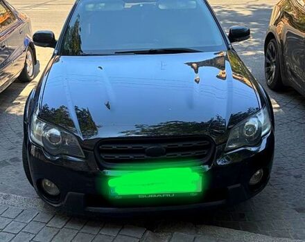 Черный Субару Легаси, объемом двигателя 2.5 л и пробегом 300 тыс. км за 5000 $, фото 1 на Automoto.ua