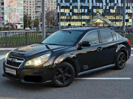 Черный Субару Легаси, объемом двигателя 2.5 л и пробегом 200 тыс. км за 7400 $, фото 1 на Automoto.ua