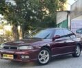 Красный Субару Легаси, объемом двигателя 2.5 л и пробегом 165 тыс. км за 3500 $, фото 1 на Automoto.ua