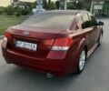 Красный Субару Легаси, объемом двигателя 2.5 л и пробегом 175 тыс. км за 7600 $, фото 2 на Automoto.ua