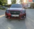 Красный Субару Легаси, объемом двигателя 2.5 л и пробегом 165 тыс. км за 7100 $, фото 1 на Automoto.ua