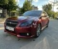 Красный Субару Легаси, объемом двигателя 2.5 л и пробегом 165 тыс. км за 7100 $, фото 1 на Automoto.ua