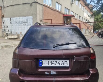 Красный Субару Легаси, объемом двигателя 2.5 л и пробегом 270 тыс. км за 1700 $, фото 4 на Automoto.ua