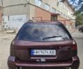 Красный Субару Легаси, объемом двигателя 2.5 л и пробегом 270 тыс. км за 1700 $, фото 4 на Automoto.ua