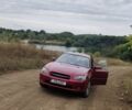 Красный Субару Легаси, объемом двигателя 2.5 л и пробегом 380 тыс. км за 4812 $, фото 1 на Automoto.ua