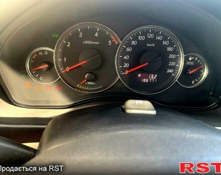 Красный Субару Легаси, объемом двигателя 2 л и пробегом 188 тыс. км за 5500 $, фото 2 на Automoto.ua