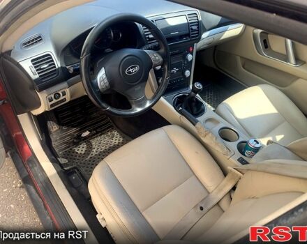 Красный Субару Легаси, объемом двигателя 2 л и пробегом 188 тыс. км за 5500 $, фото 1 на Automoto.ua