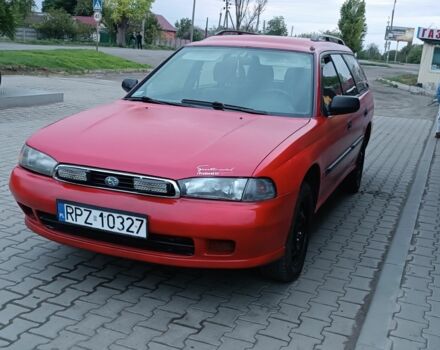Красный Субару Легаси, объемом двигателя 2 л и пробегом 200 тыс. км за 1800 $, фото 1 на Automoto.ua