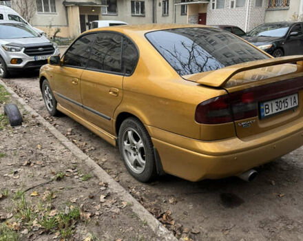 Желтый Субару Легаси, объемом двигателя 2.46 л и пробегом 345 тыс. км за 4100 $, фото 7 на Automoto.ua