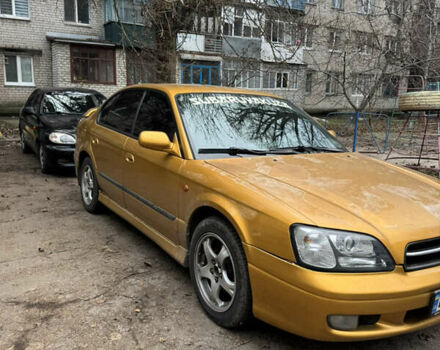 Желтый Субару Легаси, объемом двигателя 2.46 л и пробегом 345 тыс. км за 4100 $, фото 3 на Automoto.ua
