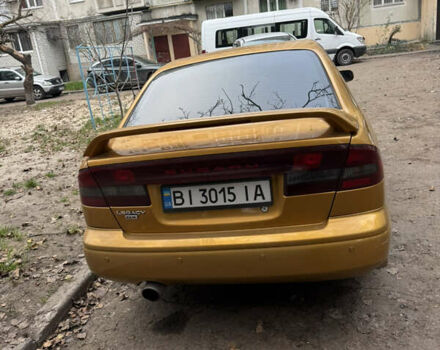 Желтый Субару Легаси, объемом двигателя 2.46 л и пробегом 345 тыс. км за 4100 $, фото 6 на Automoto.ua