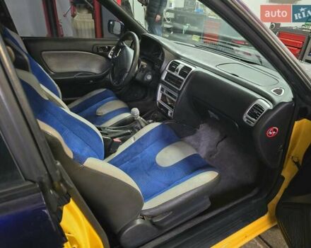 Жовтий Субару Легасі, об'ємом двигуна 2.46 л та пробігом 137 тис. км за 3300 $, фото 6 на Automoto.ua