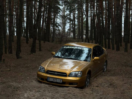 Желтый Субару Легаси, объемом двигателя 2.46 л и пробегом 345 тыс. км за 4100 $, фото 1 на Automoto.ua