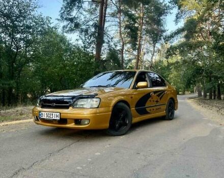 Желтый Субару Легаси, объемом двигателя 2.5 л и пробегом 420 тыс. км за 3700 $, фото 1 на Automoto.ua