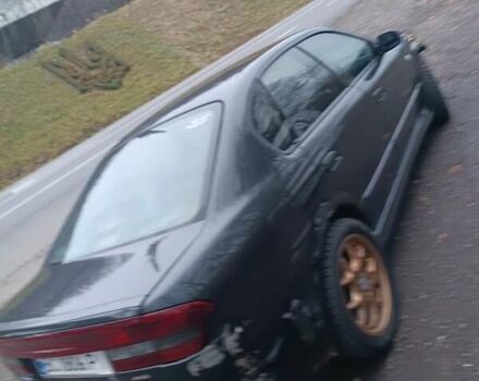 Сірий Субару Легасі, об'ємом двигуна 2 л та пробігом 400 тис. км за 2950 $, фото 2 на Automoto.ua