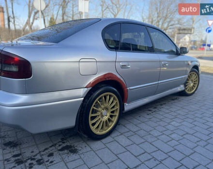 Синій Субару Легасі, об'ємом двигуна 2.46 л та пробігом 380 тис. км за 2999 $, фото 2 на Automoto.ua