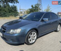 Синий Субару Легаси, объемом двигателя 2.5 л и пробегом 312 тыс. км за 6000 $, фото 2 на Automoto.ua