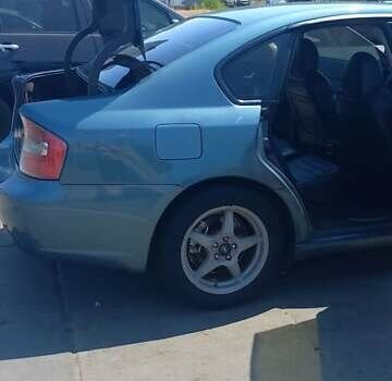 Синий Субару Легаси, объемом двигателя 1.99 л и пробегом 315 тыс. км за 5200 $, фото 1 на Automoto.ua