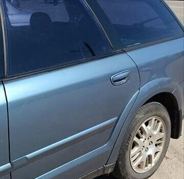 Синій Субару Легасі, об'ємом двигуна 2.46 л та пробігом 318 тис. км за 5900 $, фото 2 на Automoto.ua