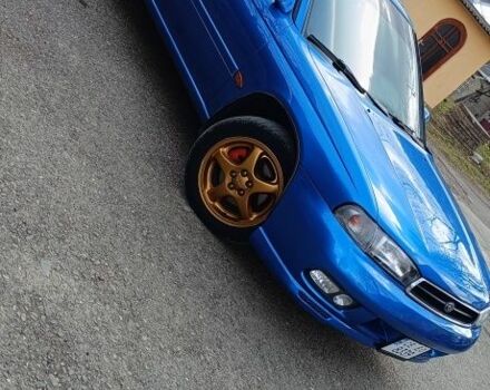 Синий Субару Легаси, объемом двигателя 2.5 л и пробегом 200 тыс. км за 4200 $, фото 1 на Automoto.ua