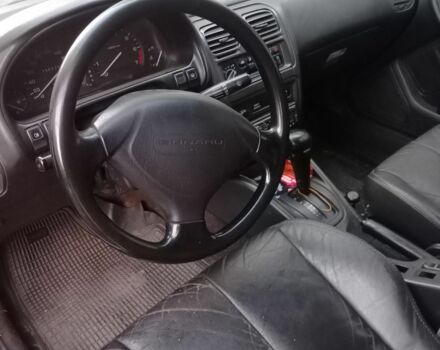 Зеленый Субару Легаси, объемом двигателя 1.5 л и пробегом 200 тыс. км за 2000 $, фото 3 на Automoto.ua