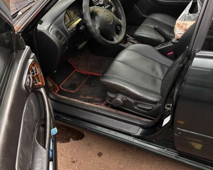 Зеленый Субару Легаси, объемом двигателя 2.5 л и пробегом 300 тыс. км за 2100 $, фото 4 на Automoto.ua