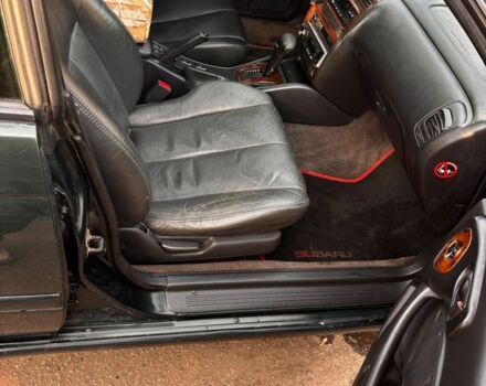 Зеленый Субару Легаси, объемом двигателя 2.5 л и пробегом 300 тыс. км за 2100 $, фото 5 на Automoto.ua