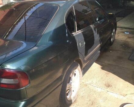 Зеленый Субару Легаси, объемом двигателя 2.5 л и пробегом 245 тыс. км за 3000 $, фото 8 на Automoto.ua