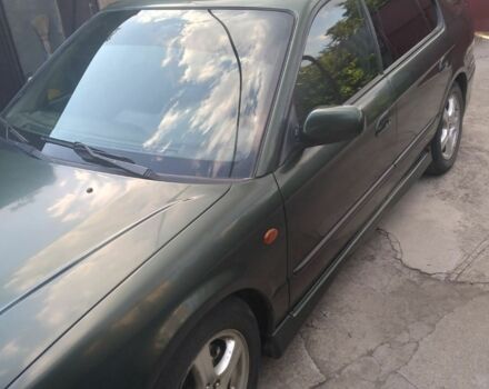 Зеленый Субару Легаси, объемом двигателя 2.5 л и пробегом 245 тыс. км за 3000 $, фото 4 на Automoto.ua