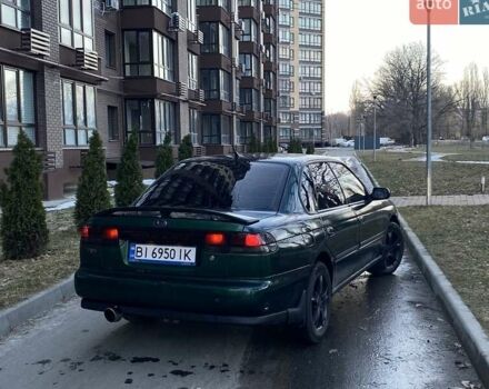 Зеленый Субару Легаси, объемом двигателя 2 л и пробегом 350 тыс. км за 2600 $, фото 1 на Automoto.ua