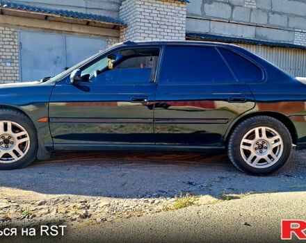 Зеленый Субару Легаси, объемом двигателя 2 л и пробегом 366 тыс. км за 3500 $, фото 1 на Automoto.ua