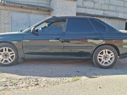 Зелений Субару Легасі, об'ємом двигуна 2 л та пробігом 300 тис. км за 4000 $, фото 1 на Automoto.ua