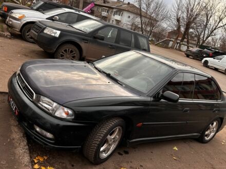 Зеленый Субару Легаси, объемом двигателя 2.5 л и пробегом 300 тыс. км за 2100 $, фото 1 на Automoto.ua