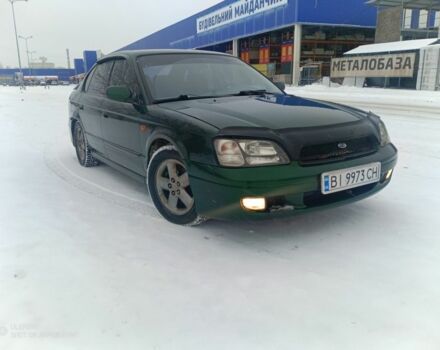 Зеленый Субару Легаси, объемом двигателя 2 л и пробегом 314 тыс. км за 3000 $, фото 1 на Automoto.ua