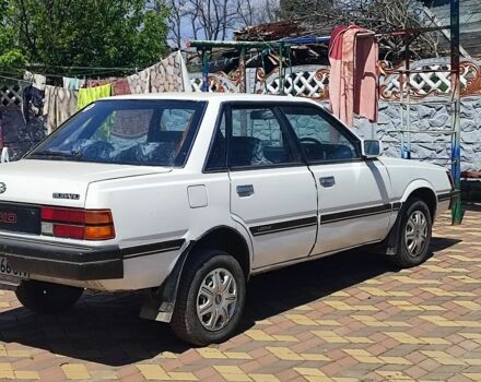 Белый Субару Леон, объемом двигателя 2 л и пробегом 200 тыс. км за 1300 $, фото 1 на Automoto.ua