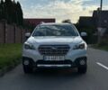 Белый Субару Аутбек, объемом двигателя 2.5 л и пробегом 218 тыс. км за 14200 $, фото 2 на Automoto.ua