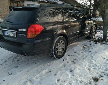 Черный Субару Аутбек, объемом двигателя 2.46 л и пробегом 316 тыс. км за 5600 $, фото 1 на Automoto.ua