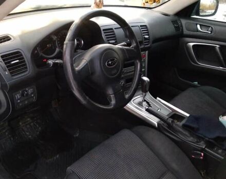 Черный Субару Аутбек, объемом двигателя 2.46 л и пробегом 316 тыс. км за 5600 $, фото 4 на Automoto.ua