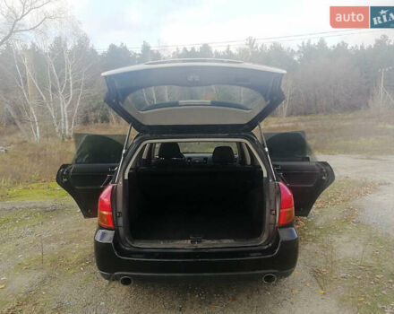 Черный Субару Аутбек, объемом двигателя 2.46 л и пробегом 252 тыс. км за 5650 $, фото 4 на Automoto.ua