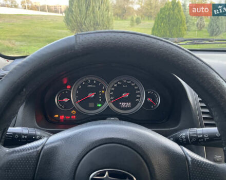 Черный Субару Аутбек, объемом двигателя 2.5 л и пробегом 325 тыс. км за 6600 $, фото 6 на Automoto.ua