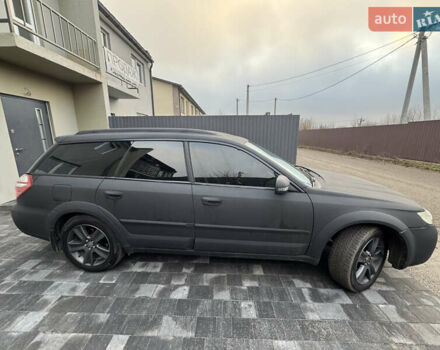 Черный Субару Аутбек, объемом двигателя 2.46 л и пробегом 272 тыс. км за 9000 $, фото 2 на Automoto.ua