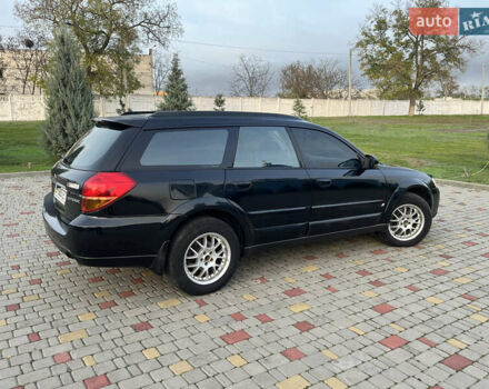 Черный Субару Аутбек, объемом двигателя 2.5 л и пробегом 325 тыс. км за 6600 $, фото 2 на Automoto.ua