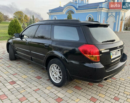 Черный Субару Аутбек, объемом двигателя 2.5 л и пробегом 325 тыс. км за 6600 $, фото 4 на Automoto.ua