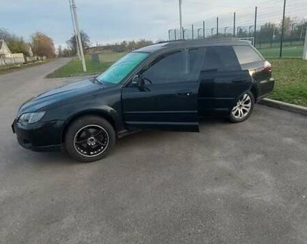 Черный Субару Аутбек, объемом двигателя 3 л и пробегом 325 тыс. км за 8500 $, фото 1 на Automoto.ua