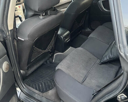 Черный Субару Аутбек, объемом двигателя 2.5 л и пробегом 325 тыс. км за 6600 $, фото 10 на Automoto.ua