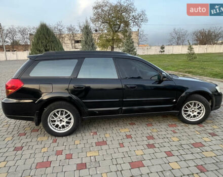 Черный Субару Аутбек, объемом двигателя 2.5 л и пробегом 325 тыс. км за 6600 $, фото 14 на Automoto.ua