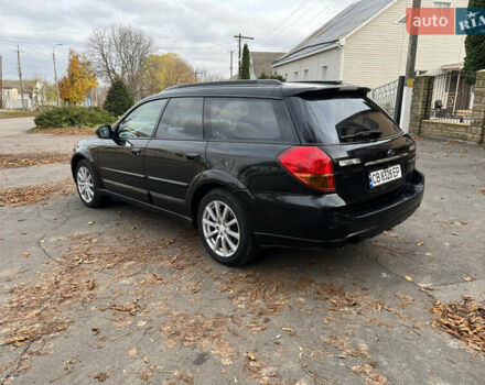 Черный Субару Аутбек, объемом двигателя 2.46 л и пробегом 220 тыс. км за 6700 $, фото 5 на Automoto.ua
