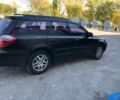 Черный Субару Аутбек, объемом двигателя 2.5 л и пробегом 240 тыс. км за 9000 $, фото 2 на Automoto.ua