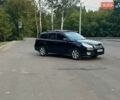 Черный Субару Аутбек, объемом двигателя 2.46 л и пробегом 304 тыс. км за 9000 $, фото 1 на Automoto.ua